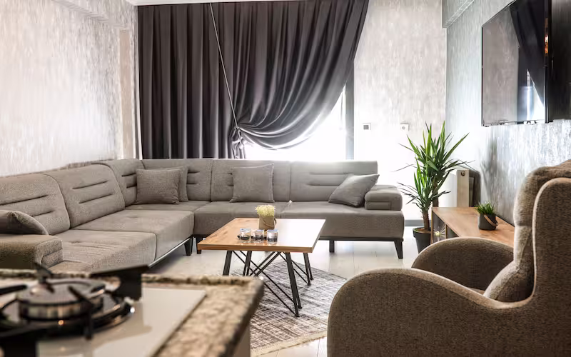 Çınar Suit Hotel Buca 1+1 deluxe suit oda ve oturma alanı